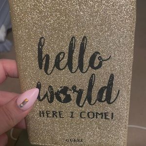 Used but good condition guess passport holder